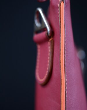 Sac main pochette cuir bordeaux orange maroquinerie Lyon